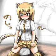 クッションでくつろぐチーターと謎のオブジェクト