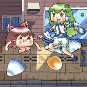 疾風拳を放つ東風谷早苗さんと虎煌拳を放つゆっくりさん