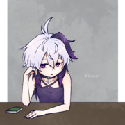 カウンターの端の花。