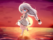 夕暮れの波打ち際のあかり