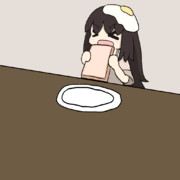 トーストを食べる頭に目玉焼きを乗せた