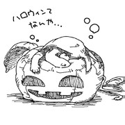 かぼちゃのぬいぐるみをベッドにして寝るクサガメ