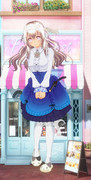 お菓子屋さんの前で