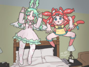 ベッドで飛び跳ねる二人