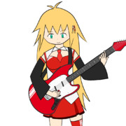 ギターを弾くマキさん