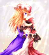 霊夢を抱きしめる紫