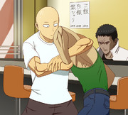 アームロックをかけるヒーロー