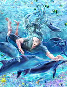 イルカと泳ぐ人