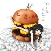 チーズバーガーに挟まれてるよ