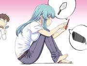 熱心にスマホいじり