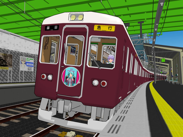 曲利駅を通過する阪急電車
